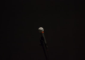 black corded microphone with stand